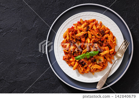 Penne rigate with smoked sausage cubes, sauce Penne rigate with smoked sausage cubes, sauce 142840679
