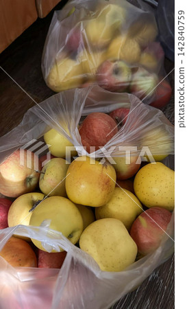 Fresh Apples in Plastic Bags Fresh Apples in Plastic Bags 142840759