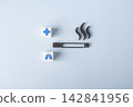 Smoking health risks and lung damage concept with cigarette and medical symbols 142841956