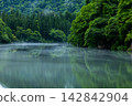 River fog from the Hayato ferry landing at Mugenkyo Gorge. 142842904