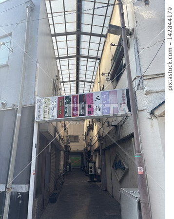 A drinking district in a back alley lined with old-fashioned snack bars in Mishima City A drinking district in a back alley lined with old-fashioned snack bars in Mishima City 142844179