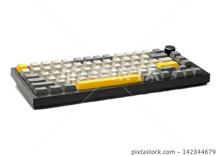 Minimalist keyboard with black frame and yellow accents 142844679
