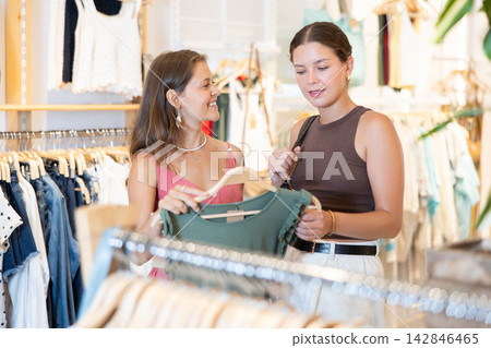 Two Women Shopping Together Two Women Shopping Together 142846465