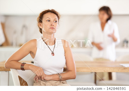 Family quarrel - two Women fight in Kitchen 142846591
