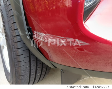 Damaged car; damage from a collision. Damaged car; damage from a collision. 142847223