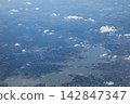 Aerial view overlooking the complex coastline and lakeshore. 142847347
