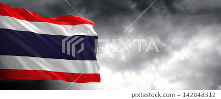 Thailand Flag Waving Against Dark Cloudy Sky Thailand Flag Waving Against Dark Cloudy Sky 142848312