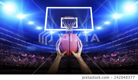 Basketball Player Facing the Hoop on Court Basketball Player Facing the Hoop on Court 142848377