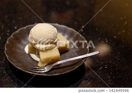 Sweet potato jelly topped with vanilla ice cream Sweet potato jelly topped with vanilla ice cream 142849566