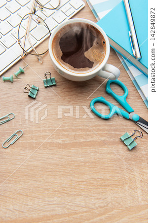 Overhead view of a modern desk with business essentials Overhead view of a modern desk with business essentials 142849872