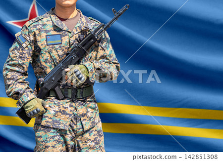 Aruba flag with soldier holding assault rifle Aruba flag with soldier holding assault rifle 142851308