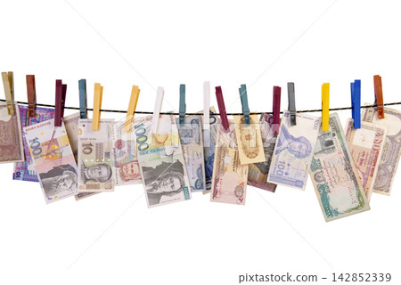 banknotes are hanging on a clothesline banknotes are hanging on a clothesline 142852339