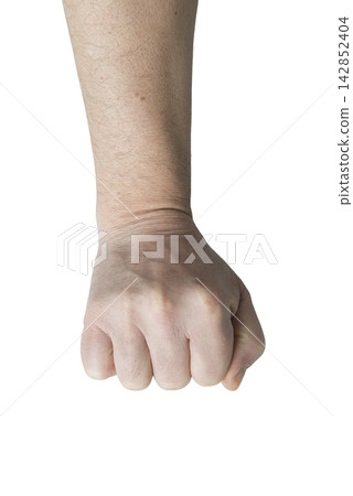 A close-up shot shows a human fist clenched. A close-up shot shows a human fist clenched. 142852404