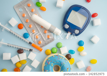 Diabetes with digital blood glucose measure with sugar. Diabetes with digital blood glucose measure with sugar. 142852973