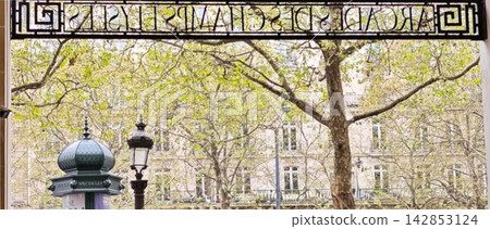 Entrance to an arcade shop facing the Champs-Élysées in the 8th arrondissement of Paris, France. 142853124