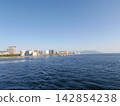A view of Kagoshima city from the sea (Kagoshima City, Kagoshima Prefecture) 142854238