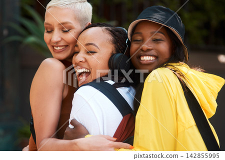 Friends, girls and hug in city with laughing for bonding, funny joke or streetwear with support outdoor in nature. People, women and happy in town with edgy style, trendy clothes or confident embrace Friends, girls and hug in city with laughing for bonding, funny joke or streetwear with support outdoor in nature. People, women and happy in town with edgy style, trendy clothes or confident embrace 142855995