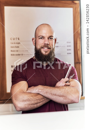 Confidence, tools and portrait of man in barbershop with scissors, comb and hair care at trendy small business. Style, face and happy barber with equipment for grooming service, haircut and skills. Confidence, tools and portrait of man in barbershop with scissors, comb and hair care at trendy small business. Style, face and happy barber with equipment for grooming service, haircut and skills. 142856230