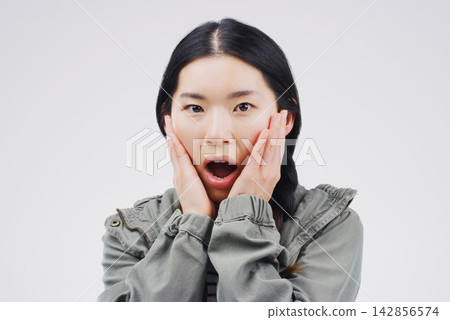 Surprised, portrait and asian woman in studio for gossip, drama or announcement on white background. Wow, covering face and shocked female person for fake news, wtf reaction or omg with mockup Surprised, portrait and asian woman in studio for gossip, drama or announcement on white background. Wow, covering face and shocked female person for fake news, wtf reaction or omg with mockup 142856574
