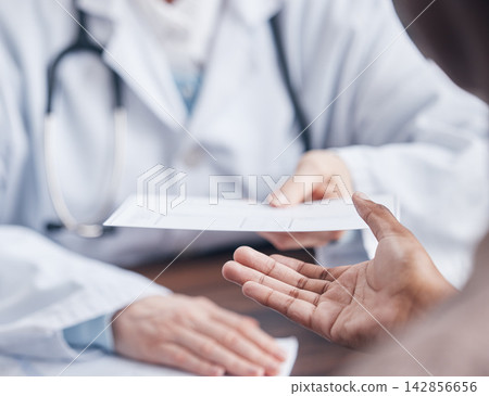 Advice, people and doctor in consultation with prescription for diagnosis in hospital or clinic. Person, patient and healthcare worker with medical note for symptoms in office for support or wellness 142856656