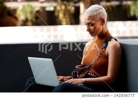 Woman, laptop and remote work in city for online project planning as ux designer, website or research. Female person, networking and communication email in town for freelance, writing or entrepreneur Woman, laptop and remote work in city for online project planning as ux designer, website or research. Female person, networking and communication email in town for freelance, writing or entrepreneur 142856777