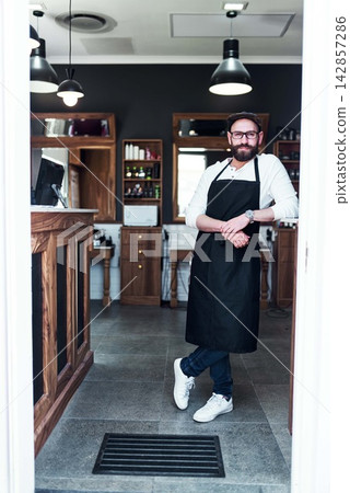 Barber, shop and portrait of man for hair grooming, wellness and beard service. Professional, small business and confident person in barbershop, salon and parlor for haircare, career and styling Barber, shop and portrait of man for hair grooming, wellness and beard service. Professional, small business and confident person in barbershop, salon and parlor for haircare, career and styling 142857286