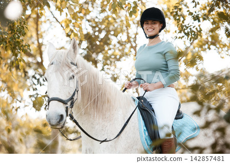 Woman, nature and horse for equestrian sport on ranch, stallion and riding hobby in countryside. Competition, training and female rider, horsemanship and outdoor trees or holiday in Argentina Woman, nature and horse for equestrian sport on ranch, stallion and riding hobby in countryside. Competition, training and female rider, horsemanship and outdoor trees or holiday in Argentina 142857481