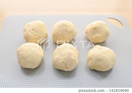 Rolling homemade oyaki dough Rolling homemade oyaki dough 142859090