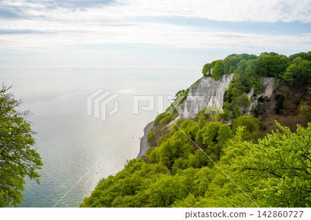 View of famous white chalk cliffs and Baltic Sea from suspension bridge in Jasmund National Park on Ruegen island, Germany 142860727