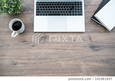 Laptop and coffee with large office copy space Laptop and coffee with large office copy space 142861697