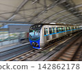 Modern MRT Jakarta electric train moving on elevated railway tracks in urban area. 142862178