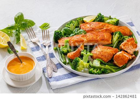 Grilled salmon with steamed green beans, broccoli Grilled salmon with steamed green beans, broccoli 142862481