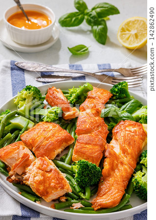 Grilled salmon with steamed green beans, broccoli 142862490