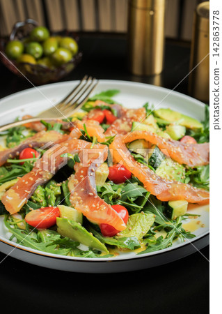 Salad with salted salmon and arugula Salad with salted salmon and arugula 142863778