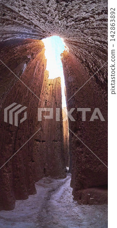 Slot Canyon Walls and Sunlit Passage in Cathedral Gorge State Park Nevada 142863892