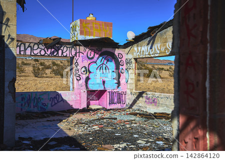 Abandoned Graffiti Covered Building Interior in Yermo California Desert Ruins Abandoned Graffiti Covered Building Interior in Yermo California Desert Ruins 142864120