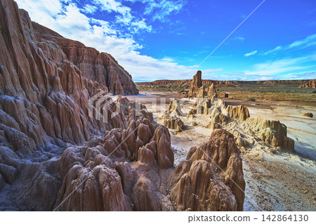 Cathedral Gorge State Park Dramatic Clay Formations and Blue Sky Landscape Nevada Cathedral Gorge State Park Dramatic Clay Formations and Blue Sky Landscape Nevada 142864130