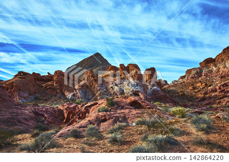 Red Rock Formations and Desert Landscape Under Vibrant Blue Sky Nevada Red Rock Formations and Desert Landscape Under Vibrant Blue Sky Nevada 142864220