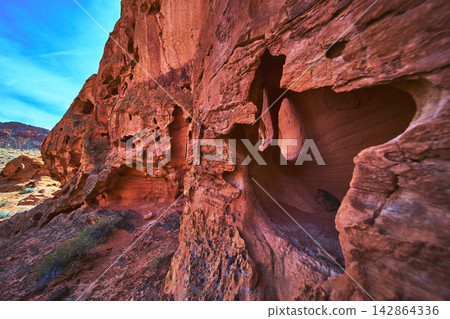 Red Sandstone Formations and Desert Alcoves in Bowl of Fire Nevada Red Sandstone Formations and Desert Alcoves in Bowl of Fire Nevada 142864336