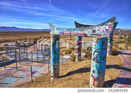 Graffiti Covered Columns and Deserted Structures at Abandoned California Water Park Graffiti Covered Columns and Deserted Structures at Abandoned California Water Park 142864580