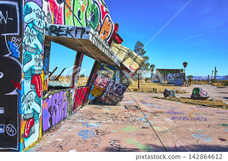 Abandoned Lake Dolores Water Park Graffiti Ruins and Desert Landscape California Abandoned Lake Dolores Water Park Graffiti Ruins and Desert Landscape California 142864612