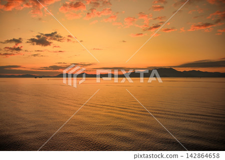 A mystical dawn viewed from a ferry bound for Hakodate, Hokkaido, on the Aomori-Seikan Ferry route - Aomori City, Aomori Prefecture (3) A mystical dawn viewed from a ferry bound for Hakodate, Hokkaido, on the Aomori-Seikan Ferry route - Aomori City, Aomori Prefecture (3) 142864658