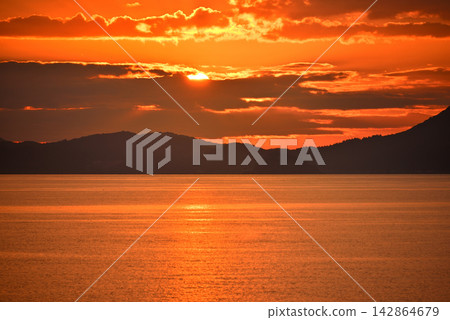 Sunrise and beautiful morning glow viewed from the ferry bound for Hakodate on the Aomori-Seikan Ferry route - Aomori City, Aomori Prefecture (1) Sunrise and beautiful morning glow viewed from the ferry bound for Hakodate on the Aomori-Seikan Ferry route - Aomori City, Aomori Prefecture (1) 142864679