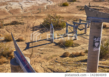 Abandoned Graffiti Covered Water Park Pillars in California Desert Abandoned Graffiti Covered Water Park Pillars in California Desert 142864849