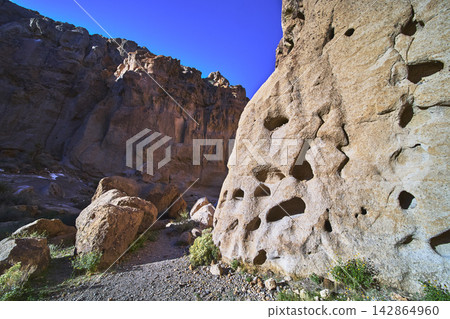 Hole In The Wall Sandstone Cliffs And Boulders In Mojave Desert California Hole In The Wall Sandstone Cliffs And Boulders In Mojave Desert California 142864960