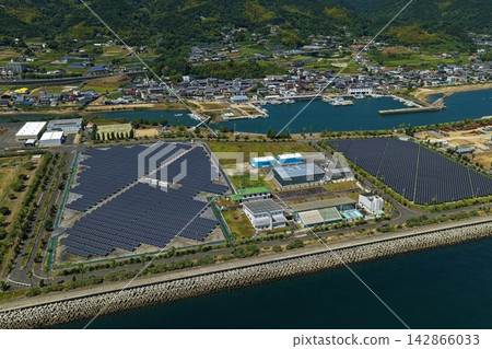 Aerial photograph capturing solar panels and coastal ports in Awaji City, Hyogo Prefecture. Aerial photograph capturing solar panels and coastal ports in Awaji City, Hyogo Prefecture. 142866033