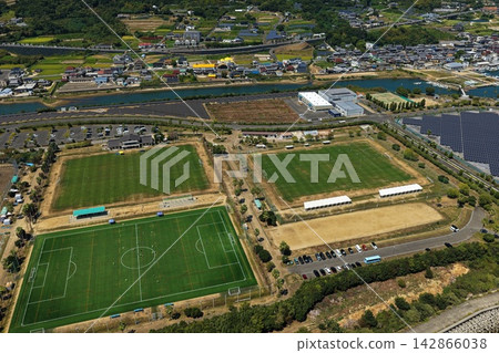 Aerial photograph of a soccer field and solar panels around Shizuki Shinshima, Awaji City, Hyogo Prefecture. Aerial photograph of a soccer field and solar panels around Shizuki Shinshima, Awaji City, Hyogo Prefecture. 142866038