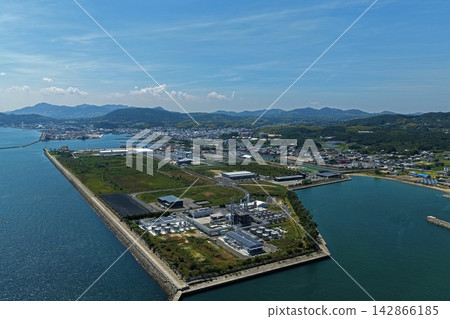 Aerial photograph showing coastal industrial facilities and reclaimed land in Awaji City, Hyogo Prefecture. Aerial photograph showing coastal industrial facilities and reclaimed land in Awaji City, Hyogo Prefecture. 142866185