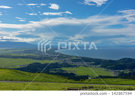 A spectacular view of the Sea of Japan and rural landscape from the summit of Mt. Kanpu on the Oga Peninsula in Akita Prefecture. A spectacular view of the Sea of Japan and rural landscape from the summit of Mt. Kanpu on the Oga Peninsula in Akita Prefecture. 142867594
