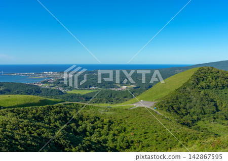 A spectacular view of the Sea of Japan and rural landscape from the summit of Mt. Kanpu on the Oga Peninsula in Akita Prefecture. A spectacular view of the Sea of Japan and rural landscape from the summit of Mt. Kanpu on the Oga Peninsula in Akita Prefecture. 142867595